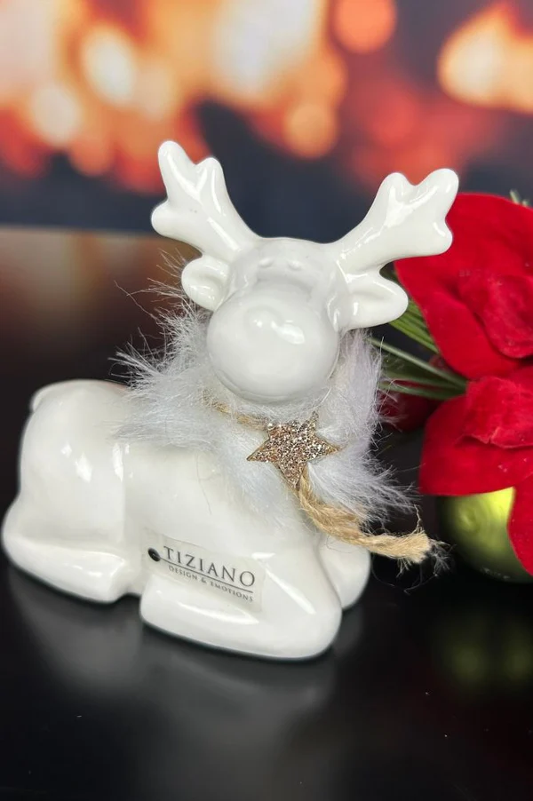 Deko Rentier Lars sitzend 10,5cm cremeweiß Deko Rentier Lars sitzend 10,5cm cremeweiß