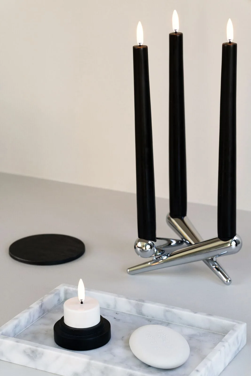 Black-tapers-with-tea-light-candle-large