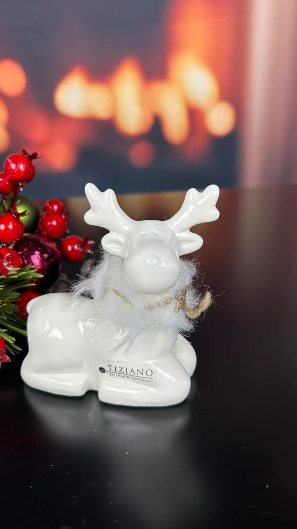 Deko Rentier Lars sitzend 10,5cm cremeweiß Deko Rentier Lars sitzend 10,5cm cremeweiß