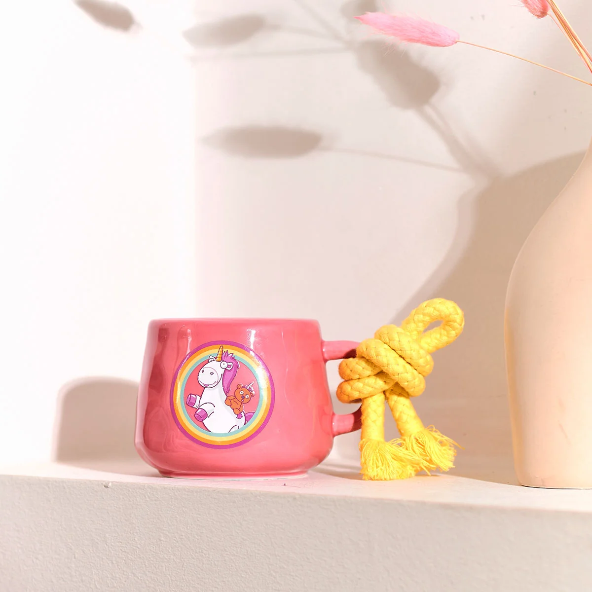 Fluffy - Minions™ Duftkerze 200g in Tasse mit Kordel Fluffy - Minions™ Duftkerze 200g in Tasse mit Kordel