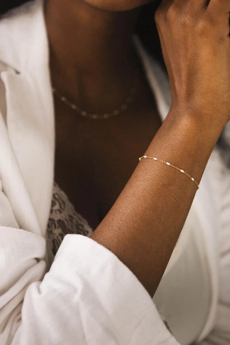 Monoi Blüte - Monoi de Iles - Armband mit schwarzen Perlen 200g Monoi Blüte - Monoi de Iles - Armband mit schwarzen Perlen 200g